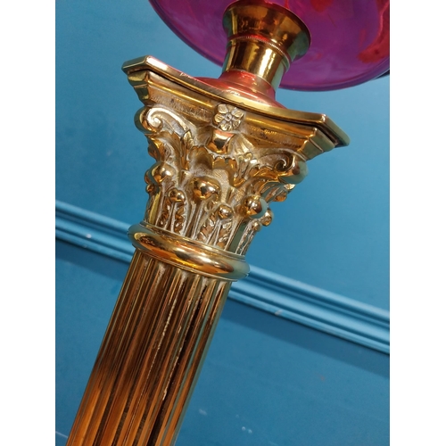 428 - 19th C. brass oil lamp with Corinthian column with ruby bowl and etched ruby glass shade. {84 cm H x... 