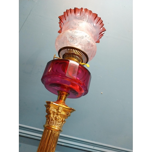 428 - 19th C. brass oil lamp with Corinthian column with ruby bowl and etched ruby glass shade. {84 cm H x... 