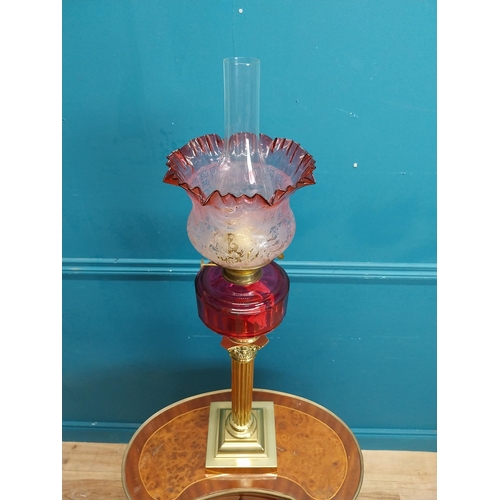 428 - 19th C. brass oil lamp with Corinthian column with ruby bowl and etched ruby glass shade. {84 cm H x... 