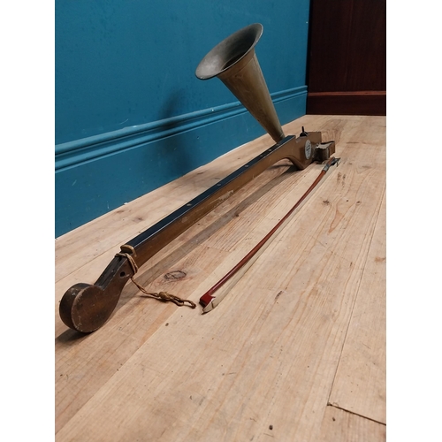 433 - Early 20th C. Stroviols fiddle with tin horn and bow. {84 cm H x 40 cm W x 18 cm D}.