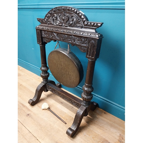 435 - 19th C. carved oak and metal gong. {98 cm H x 64 cm W x 60 cm D}.