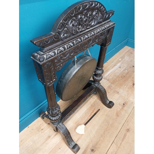 435 - 19th C. carved oak and metal gong. {98 cm H x 64 cm W x 60 cm D}.