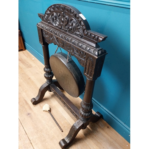 435 - 19th C. carved oak and metal gong. {98 cm H x 64 cm W x 60 cm D}.