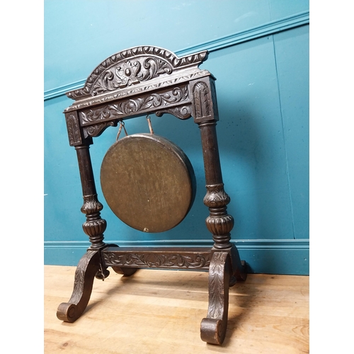 435 - 19th C. carved oak and metal gong. {98 cm H x 64 cm W x 60 cm D}.