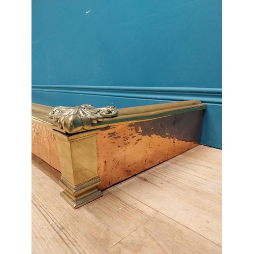 437 - 19th C. brass and copper fender. {13 cm H x 128 cm W x 39 cm D}.