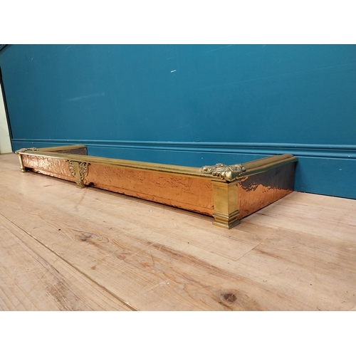 437 - 19th C. brass and copper fender. {13 cm H x 128 cm W x 39 cm D}.