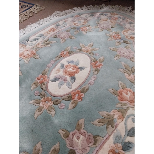 439 - Decorative oval rug. {163 cm H x 114 cm W}