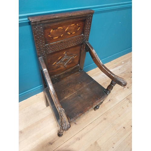 443 - 19th C. oak throne chair raised on turned legs with arms terminating in scroll detail  and inlaid pa... 