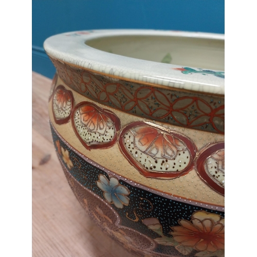 450 - Decorative ceramic jardiniere. {30 cm H x 38 cm Dia.}.