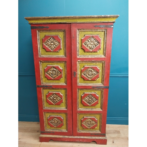 453 - 19th C. painted pine two door cupboard with eight raised carved panels with floral decoration. {149 ... 