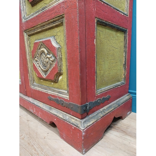 453 - 19th C. painted pine two door cupboard with eight raised carved panels with floral decoration. {149 ... 