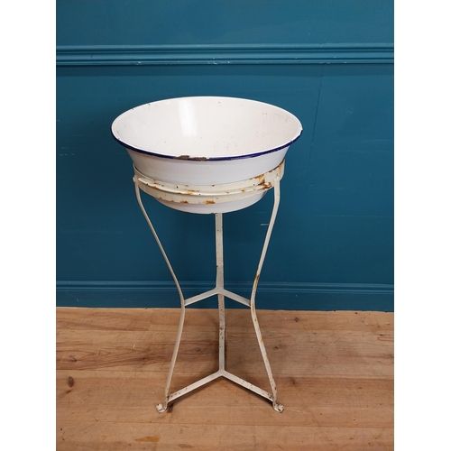 455 - Early 20th C. enamel wash basin on wrought iron stand. {89 cm H x 40 cm Dia.}.