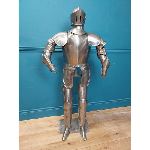 46 - Metal Suit of Armour. {140 cm H x 75 cm W x 46 cm D}.