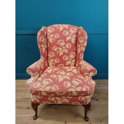 471 - Good quality mahogany and upholstered wing back armchair raised on cabriole legs in the Georgian sty... 