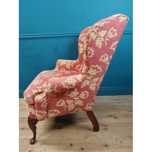 471 - Good quality mahogany and upholstered wing back armchair raised on cabriole legs in the Georgian sty... 