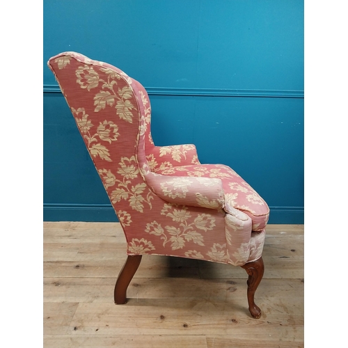 471 - Good quality mahogany and upholstered wing back armchair raised on cabriole legs in the Georgian sty... 