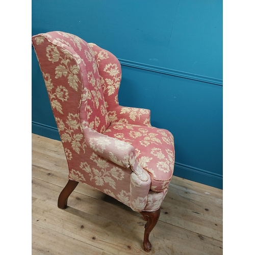 471 - Good quality mahogany and upholstered wing back armchair raised on cabriole legs in the Georgian sty... 