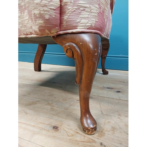 471 - Good quality mahogany and upholstered wing back armchair raised on cabriole legs in the Georgian sty... 