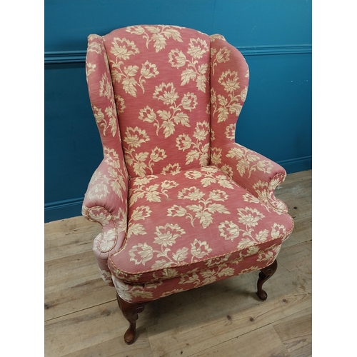 471 - Good quality mahogany and upholstered wing back armchair raised on cabriole legs in the Georgian sty... 