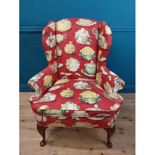 472 - Good quality mahogany and upholstered wing back armchair raised on cabriole legs in the Georgian sty... 