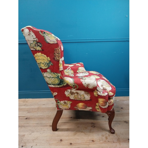 472 - Good quality mahogany and upholstered wing back armchair raised on cabriole legs in the Georgian sty... 