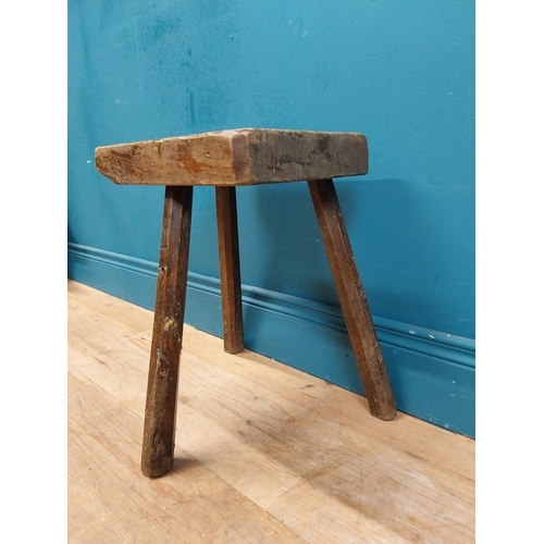 477 - Early 19th C. three legged pine carpenter's stool with square seat. {44 cm H x 38 cm W x 36 cm D}.