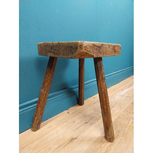 477 - Early 19th C. three legged pine carpenter's stool with square seat. {44 cm H x 38 cm W x 36 cm D}.