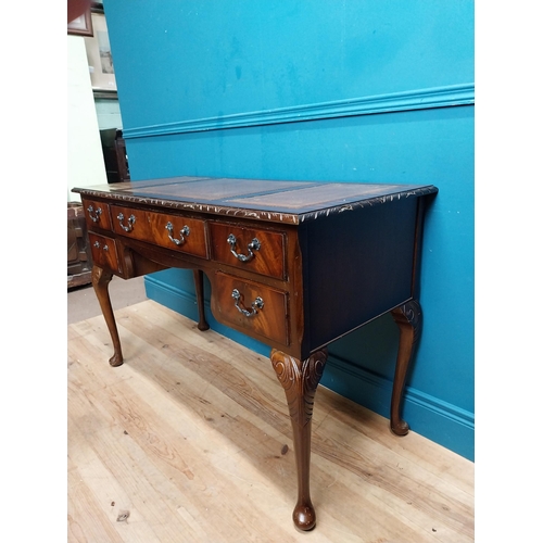 479 - Edwardian style Ladies' desk with tooled leather top with long drawer and four short drawers on cabr... 