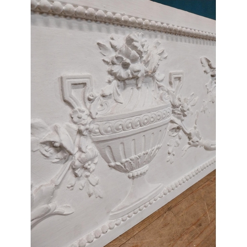 497 - Decorative plaster wall plaque depicting classical urn and decorated with foliage in the Adam's styl... 