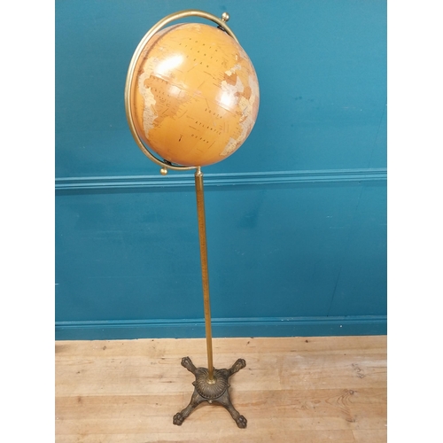 509 - Good quality World globe on brass and cast iron stand. {160 cm H x 50 cm Dia.}.