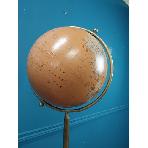 509 - Good quality World globe on brass and cast iron stand. {160 cm H x 50 cm Dia.}.