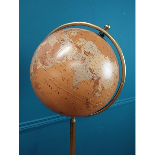 509 - Good quality World globe on brass and cast iron stand. {160 cm H x 50 cm Dia.}.