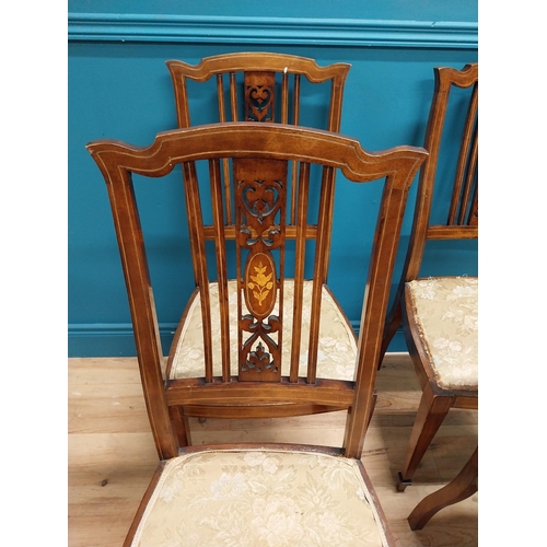 511 - Set of four Edwardian inlaid mahogany and satinwood side chairs with upholstered seat on square tape... 