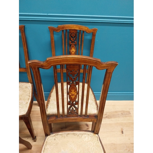 511 - Set of four Edwardian inlaid mahogany and satinwood side chairs with upholstered seat on square tape... 