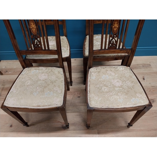 511 - Set of four Edwardian inlaid mahogany and satinwood side chairs with upholstered seat on square tape... 