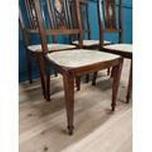 511 - Set of four Edwardian inlaid mahogany and satinwood side chairs with upholstered seat on square tape... 