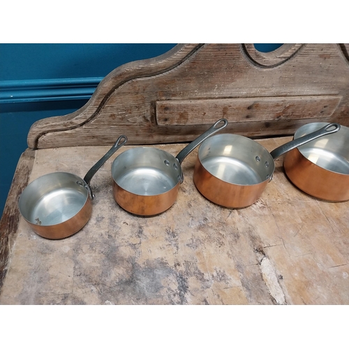 512 - Good quality set of five graduated copper saucepans. {19 cm H x 34 cm W x 18 cm D to 10 cm H x 20 cm... 