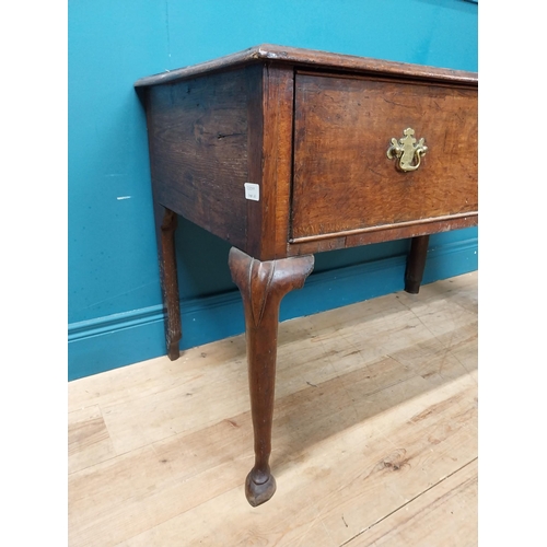 518 - 18th C. Irish oak side table with single long drawer in frieze. {71 cm H x 102 cm W x 54 cm D}.