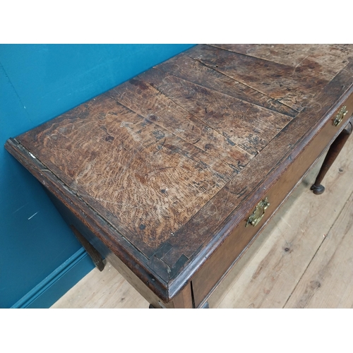 518 - 18th C. Irish oak side table with single long drawer in frieze. {71 cm H x 102 cm W x 54 cm D}.