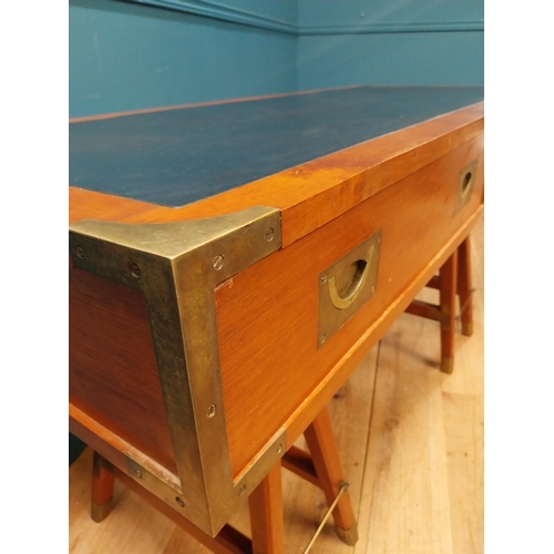 52 - Camphor wood desk with inset leather top and brass fittings in the campaign style{75cm H x 140cm W x... 