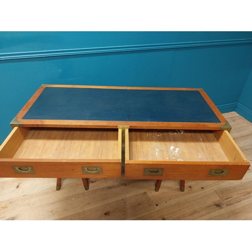 52 - Camphor wood desk with inset leather top and brass fittings in the campaign style{75cm H x 140cm W x... 