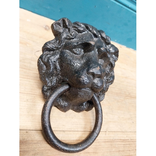 523 - 19th C. cast iron lion's mask door knocker. {20 cm H x 13 cm W x 7 cm D}.