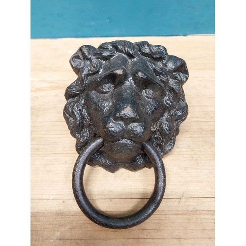 523 - 19th C. cast iron lion's mask door knocker. {20 cm H x 13 cm W x 7 cm D}.