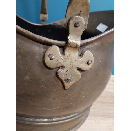 525 - Early 20th C. brass coal scuttle. {44 cm H x 40 cm W  x35 cm D}.