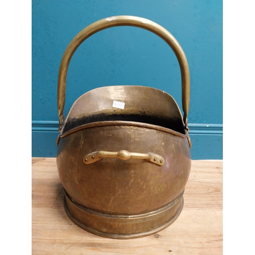 525 - Early 20th C. brass coal scuttle. {44 cm H x 40 cm W  x35 cm D}.