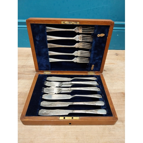 538 - Edwardian oak cased cutlery set.