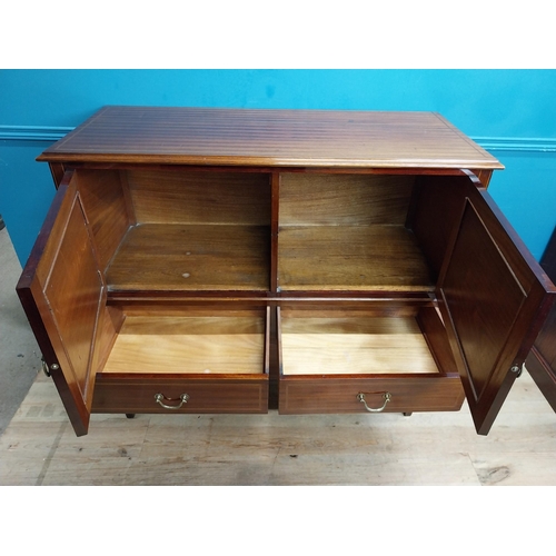 548 - Edwardian mahogany and satinwood inlaid side cabinet. {110 cm H x 122 cm W x 52 cm D}.