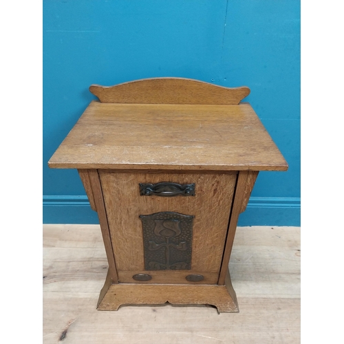 551 - Art Nouveau oak coal cabinet inset with copper panel. {62 cm H x 48 cm W x 33 cm D}.