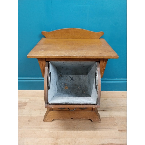 551 - Art Nouveau oak coal cabinet inset with copper panel. {62 cm H x 48 cm W x 33 cm D}.