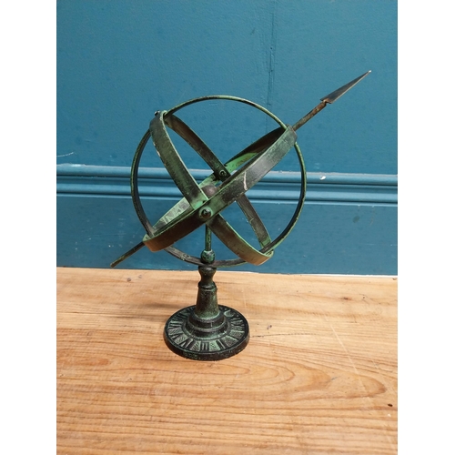 707 - Cast iron armillary sundial. {30 cm H x 30 cm W x 16 cm D}.